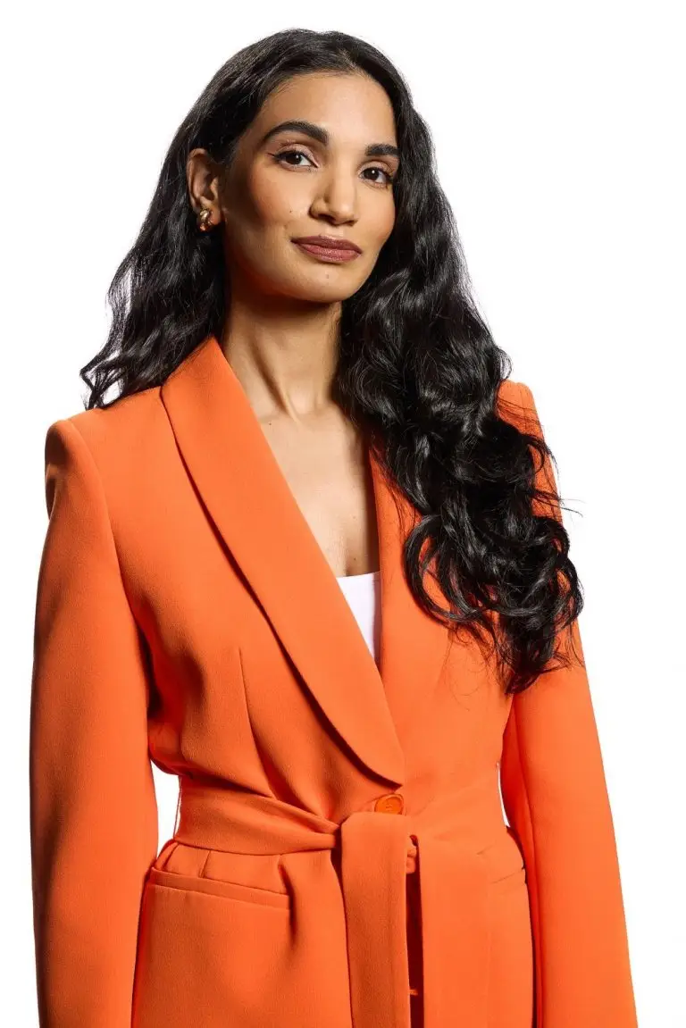 Employment lawyer Thulasi Kandiah advising a client about wrongful termination in Ontario.